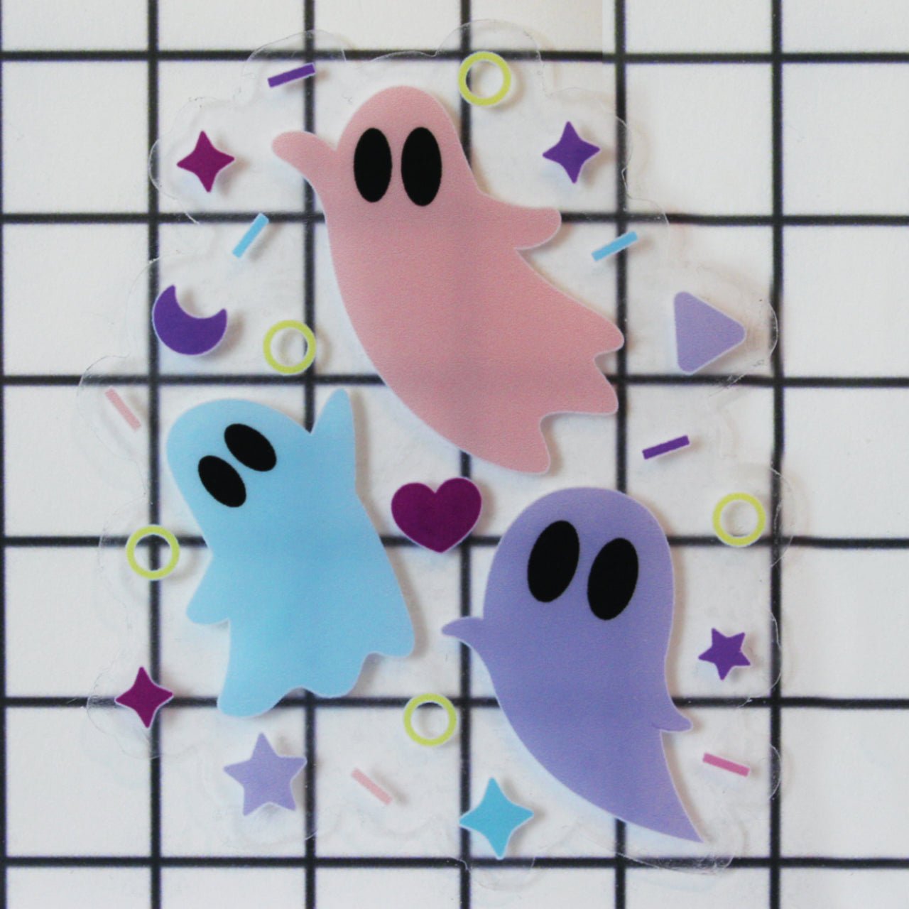 Pastel Halloween sticker with pink, blue, and lilac ghosts with clear background